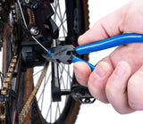 POV view using Park Tool EP-1 cable end cap crimping pliers to crimp a cable on a mountain bike derailleur