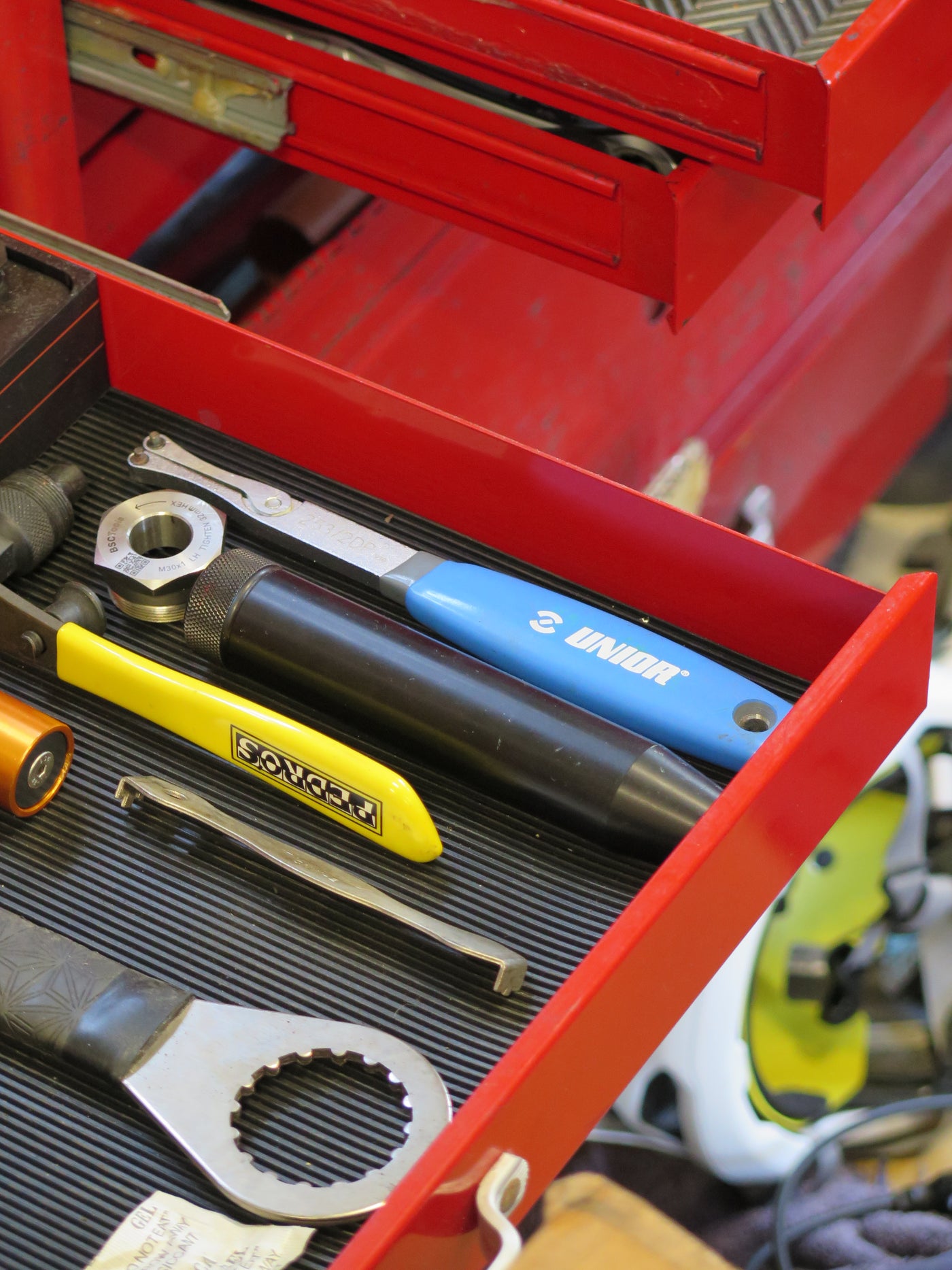 Unior crank cap driver in a red toolbox drawer