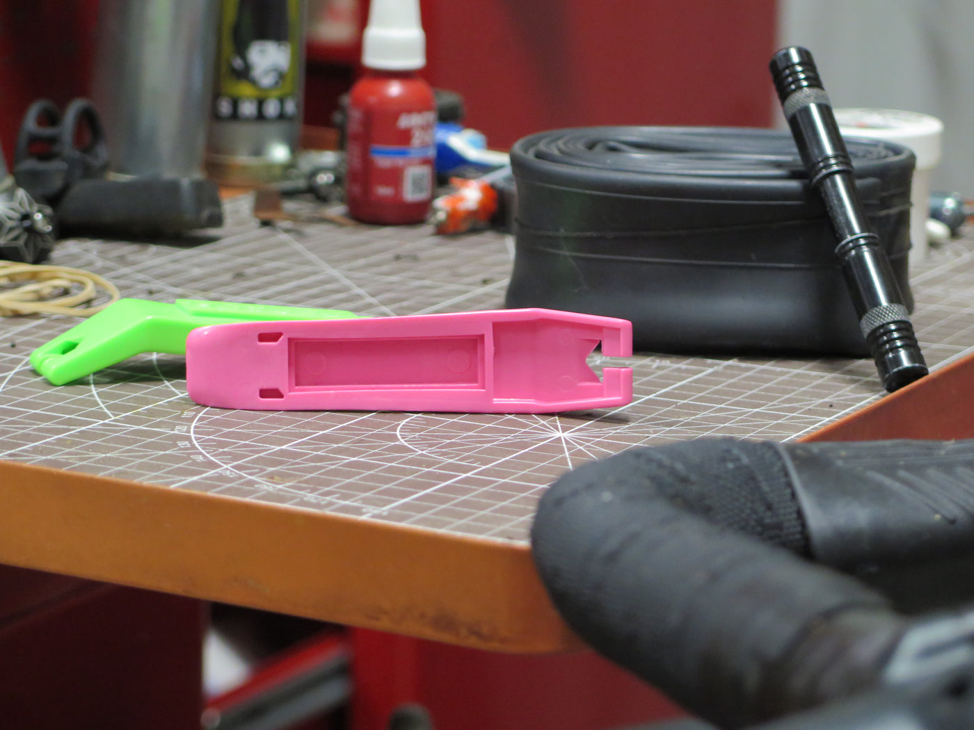 underside of pedros tyre lever on a workbench, showing open-box moulded design