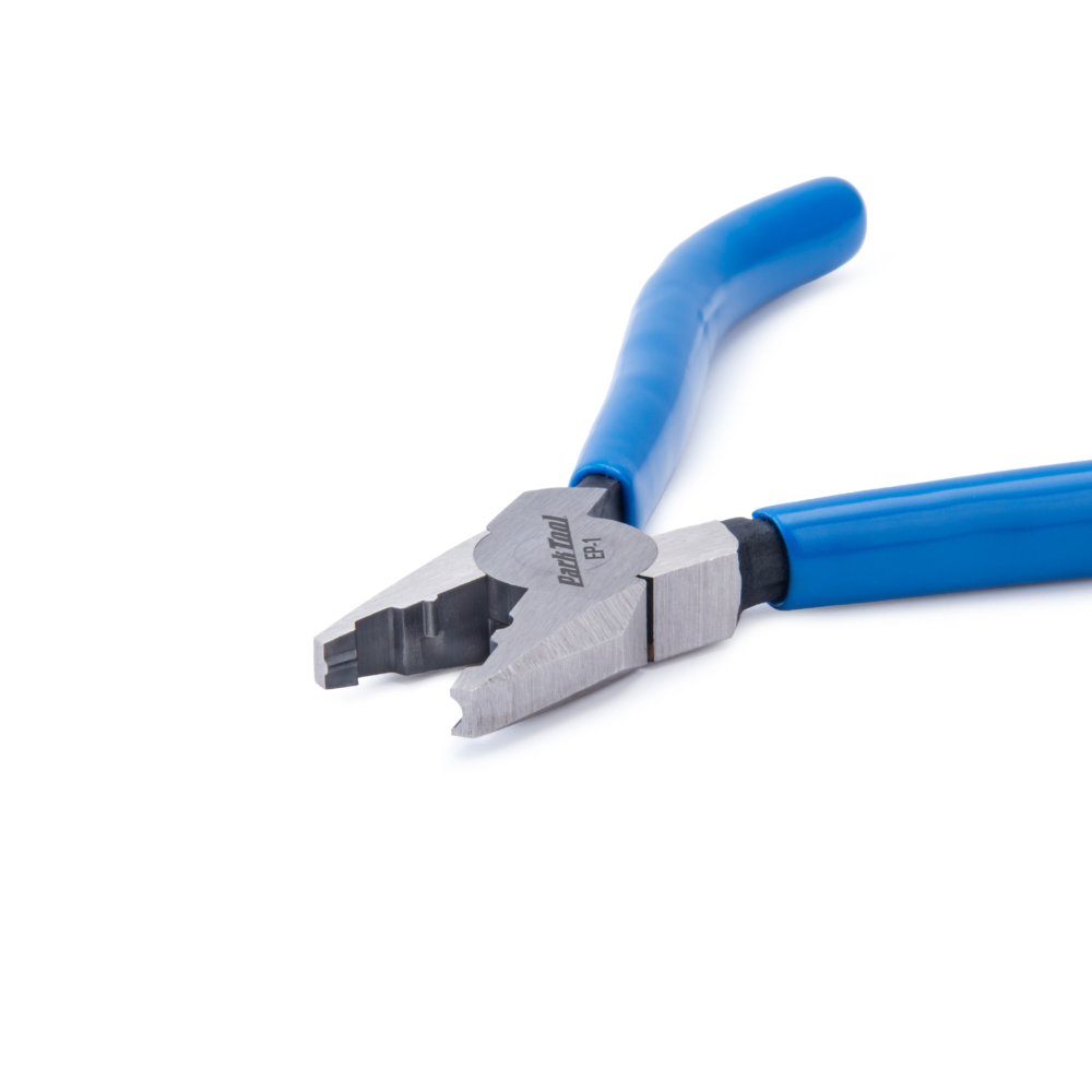 close up view of Park Tool EP-1 cable end cap crimping jaws in front of white photobooth background