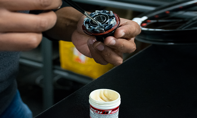 Dumonde Tech Pro X Freehub Grease being applied to Industry 9 Freehub with a Brush